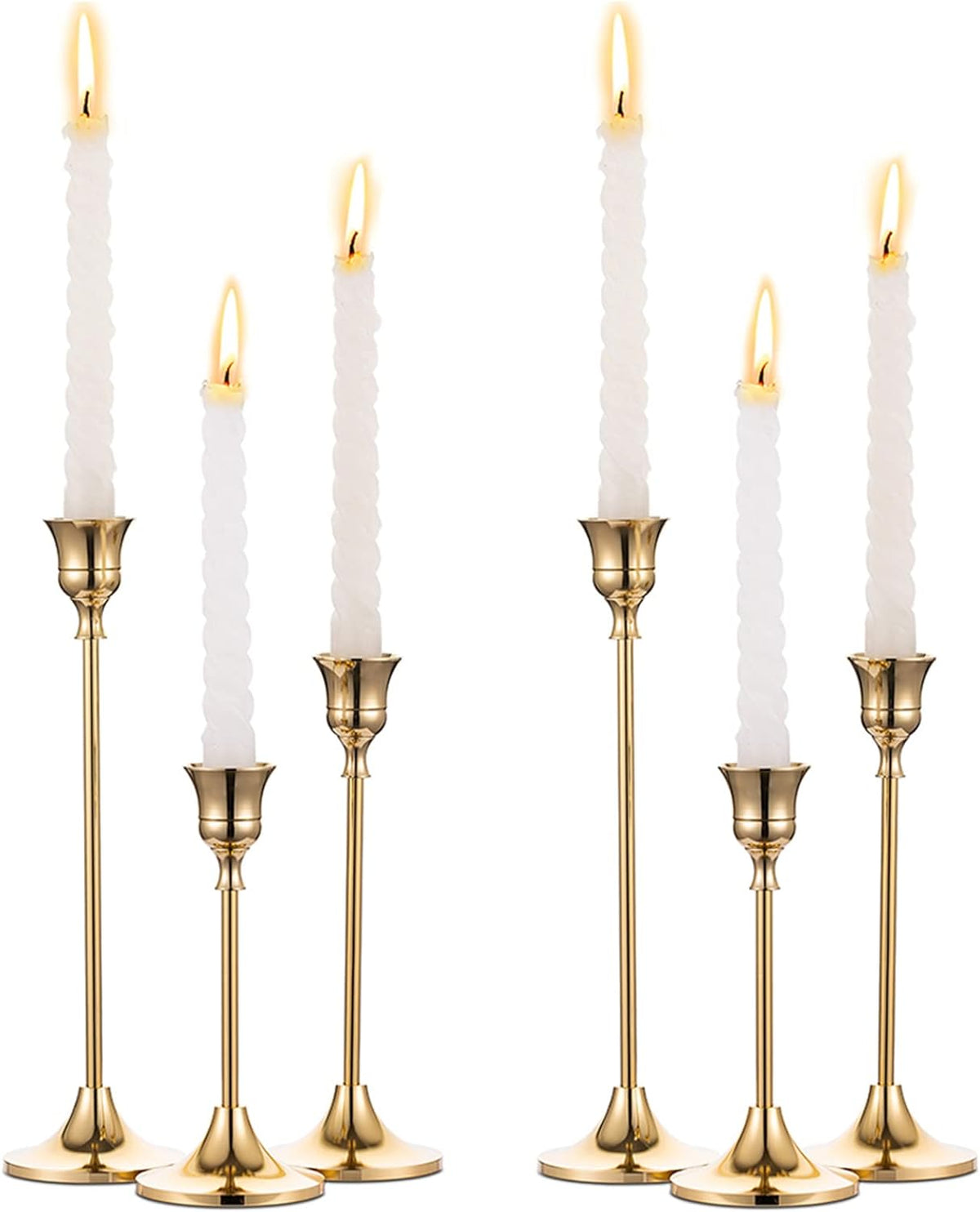 Six gold taper candle holders in three heights with white candles