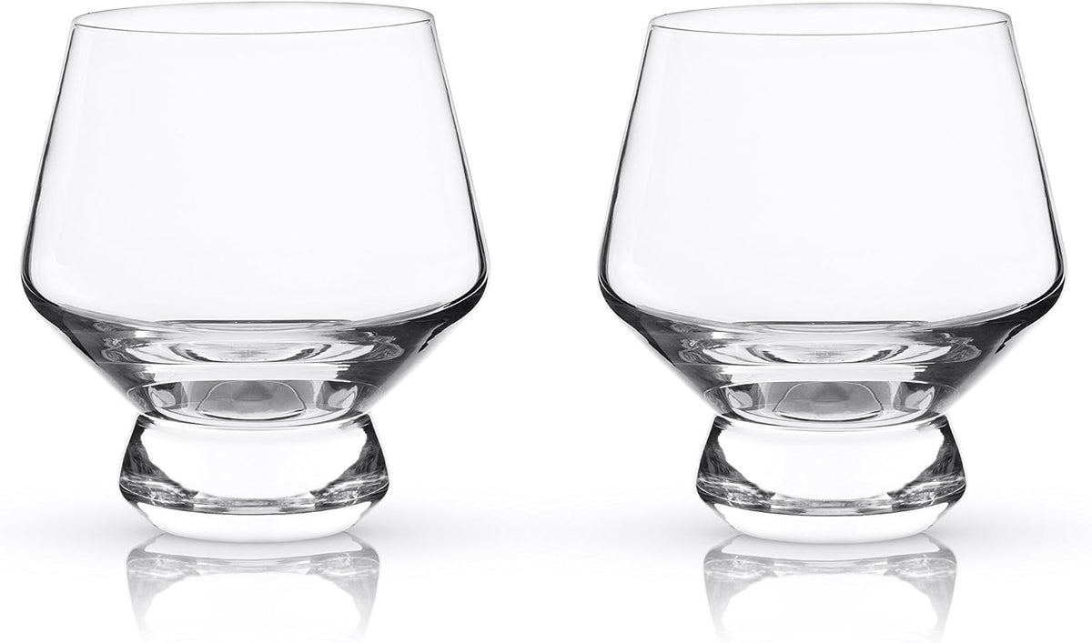 Two empty Viski Raye footed punch cups in clear crystal