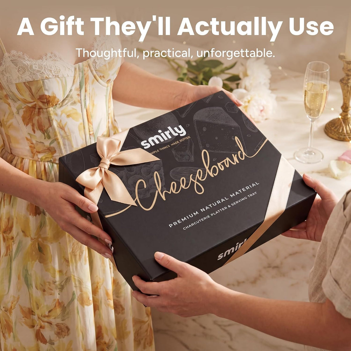 SMIRLY cheese board set in its black gift box with a ribbon