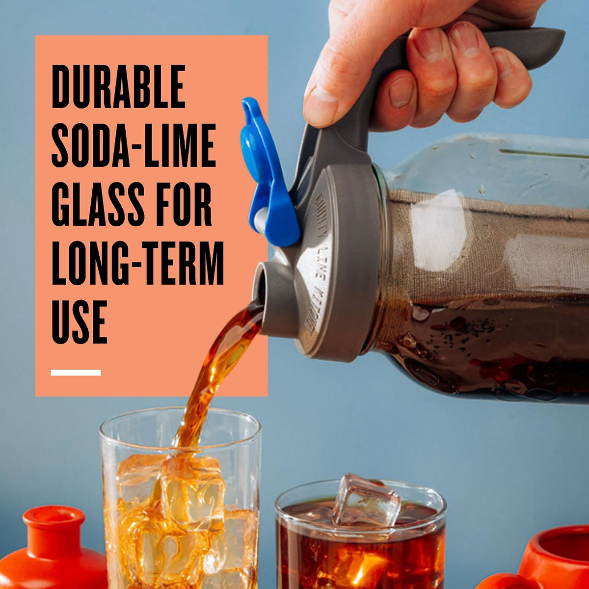 Cold brew poured from the jar's flip-cap spout over ice