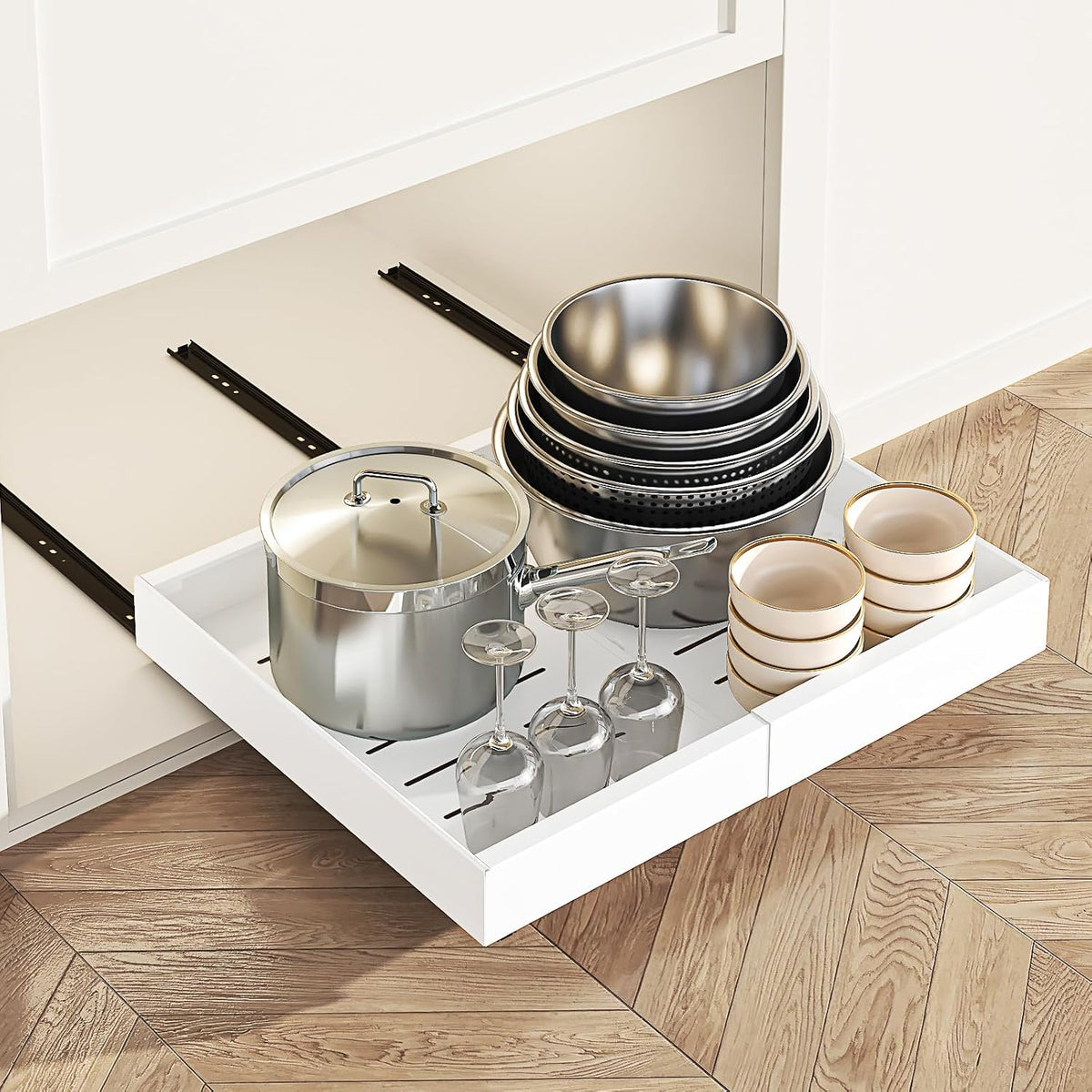White pull-out cabinet organizer holding pots and bowls
