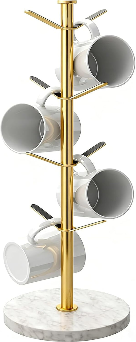 Gold mug tree with a marble base holding white mugs