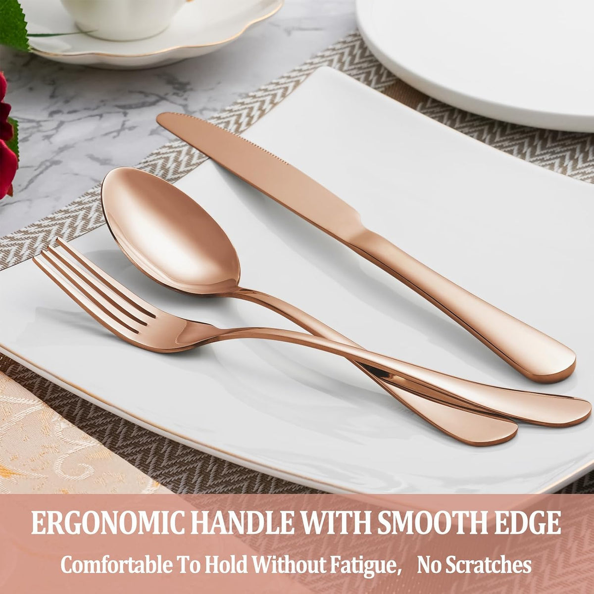 Rose gold spoon, fork and knife on a square white plate