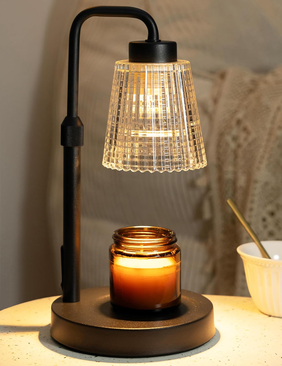 GODONLIF candle warmer lamp in black with a ribbed glass shade over a lit jar candle