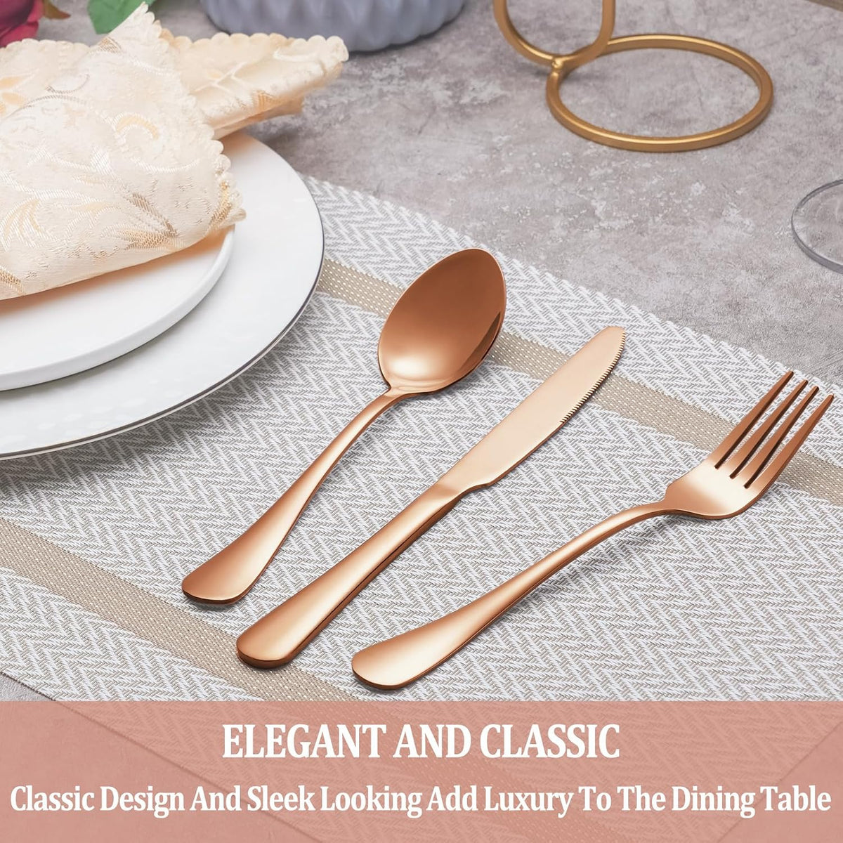 Rose gold spoon, knife and fork on a placemat beside a plate