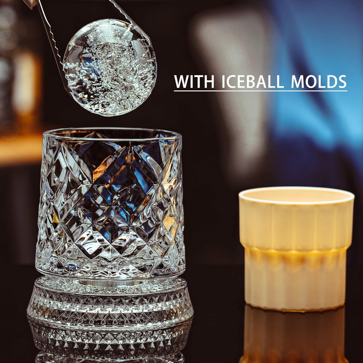 Diamond-cut whiskey glass with an ice ball and its mold