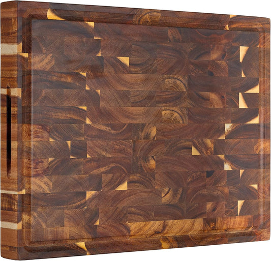 End grain acacia butcher block with a juice groove and a side handle