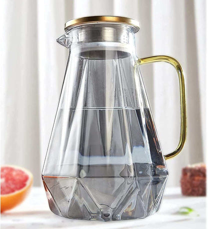 68oz glass water pitcher with gold lid and ergonomic handle for hot and cold beverages