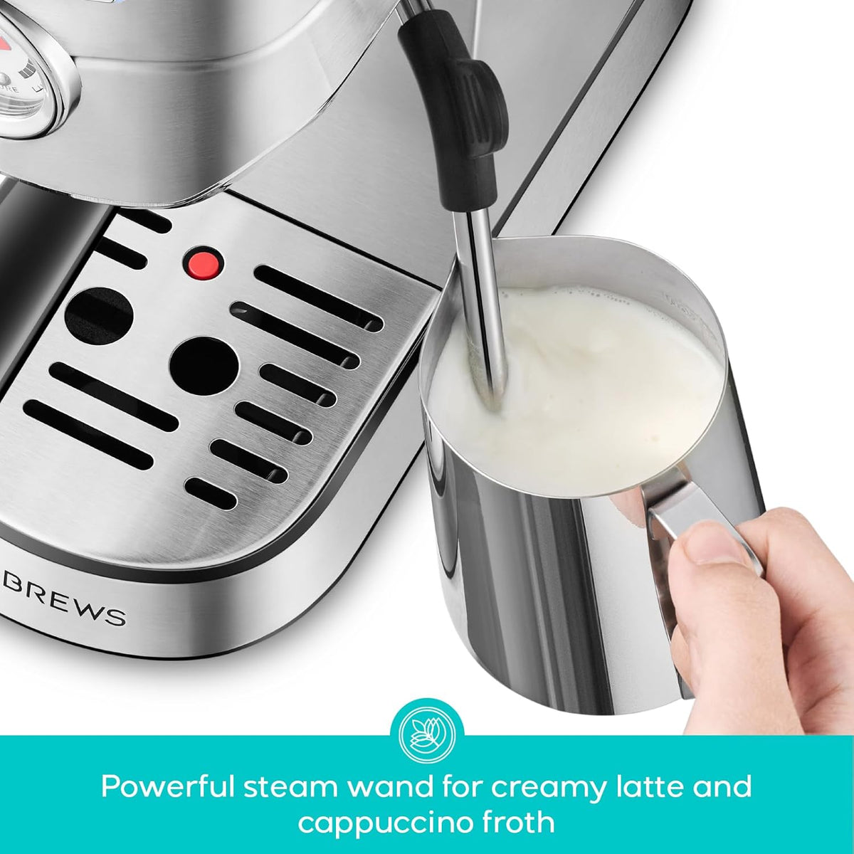 Steam wand frothing milk in a stainless steel pitcher